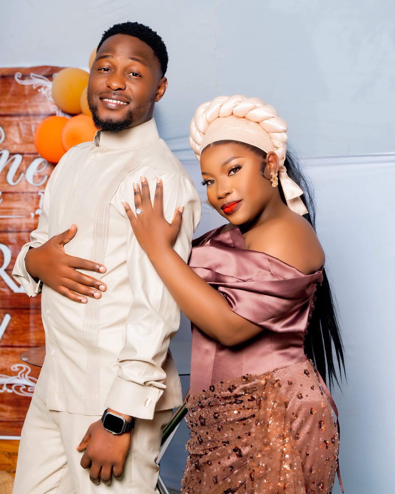 Brenda and Crescens dressed for a celebration